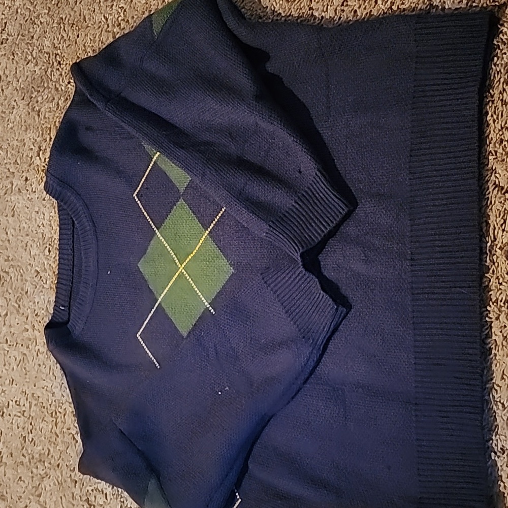 Blue sweater with grandpa sweater pattern on front